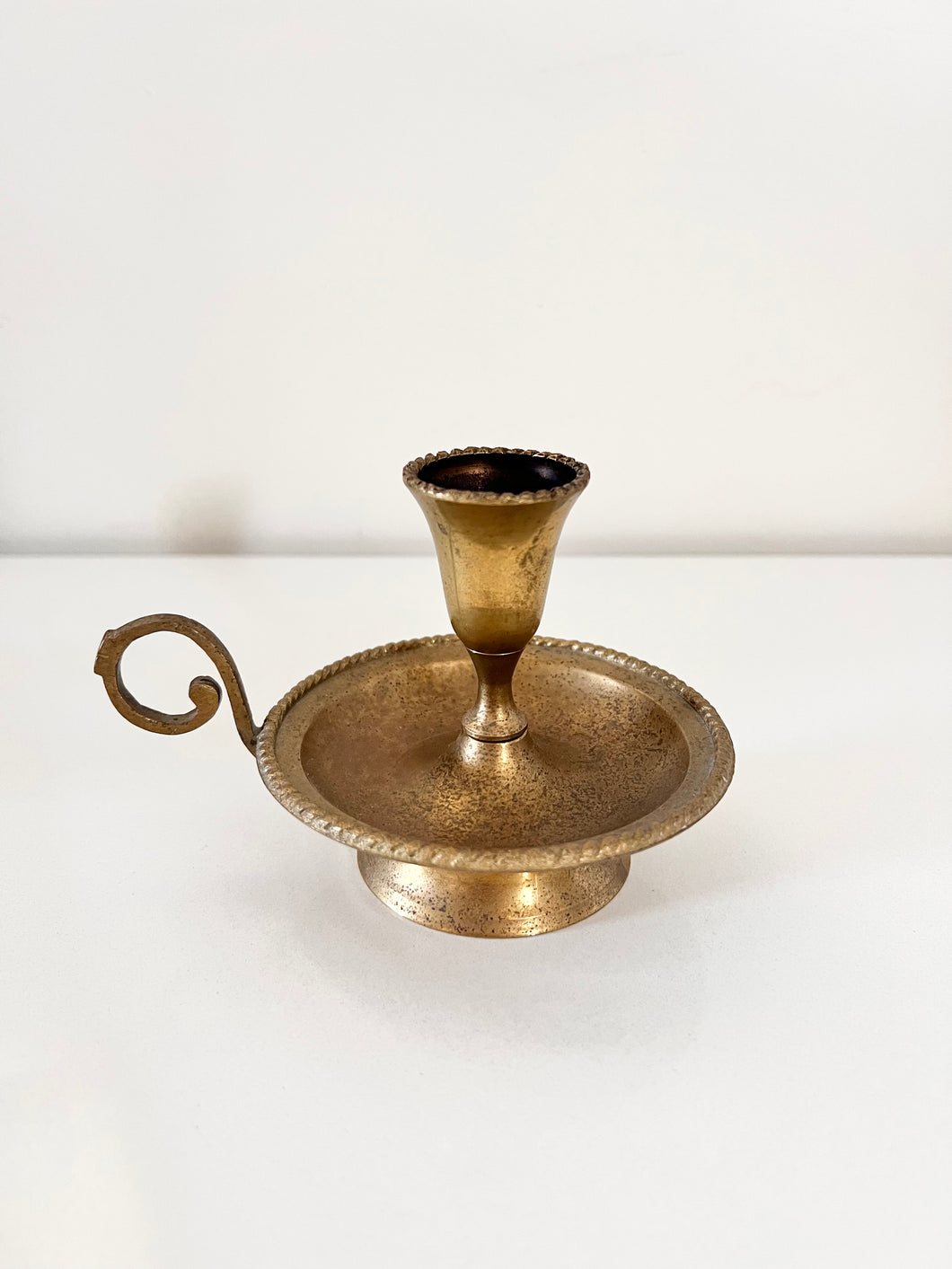 18 • Brass candlestick holder with handle