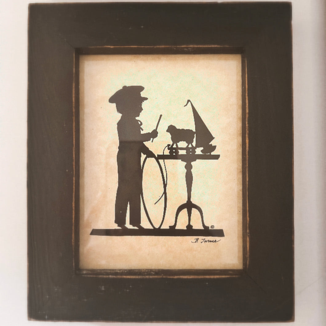 Framed Silhouette Print of Boy and His Toys