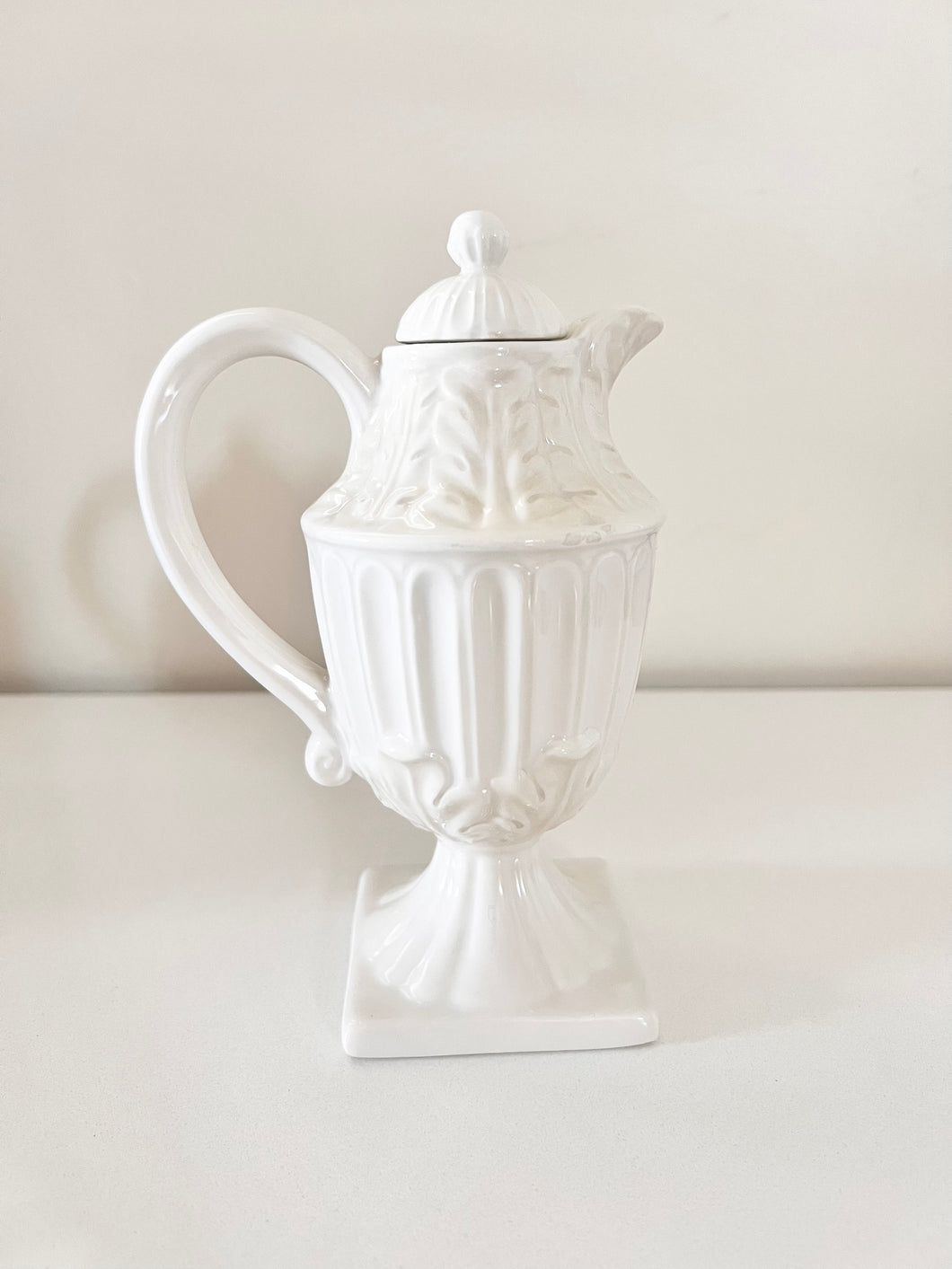 19 • Small white ceramic lidded pitcher